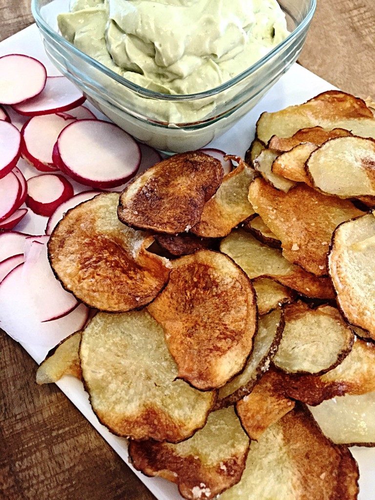 Avocado Ranch Dip with Crispy Potato Chips and radishes
