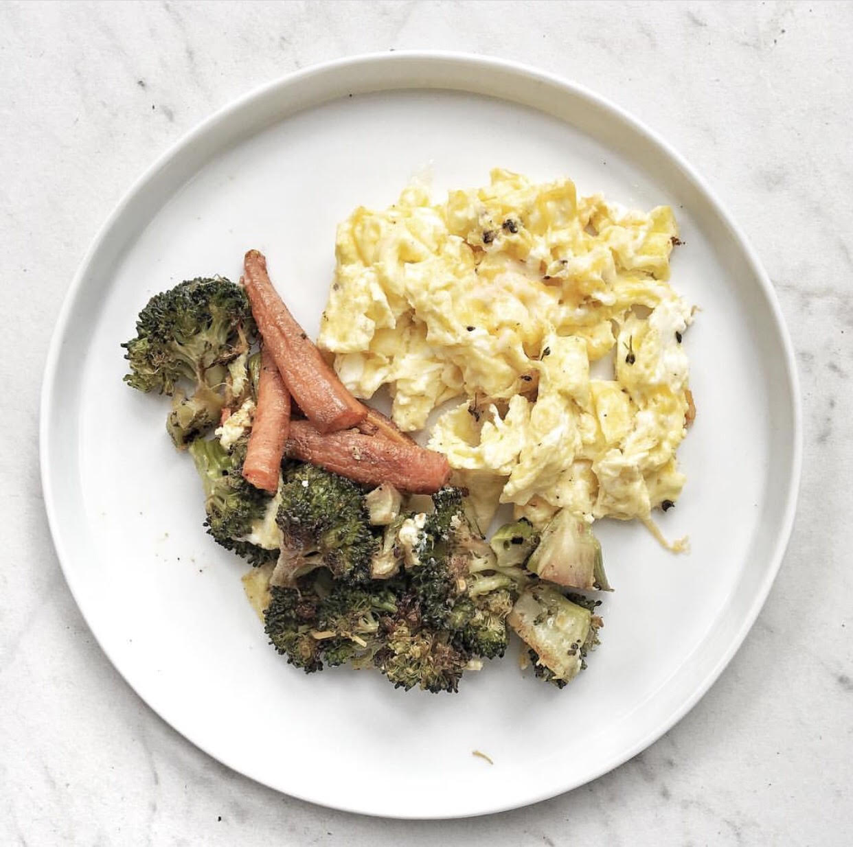 cooked broccoli and carrots with scrambled eggs