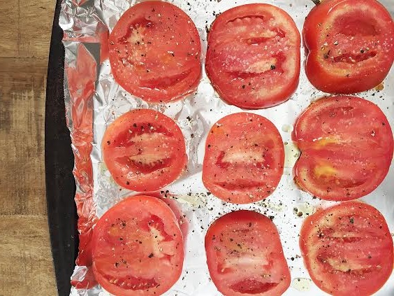 tomatoes on baking sheet